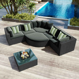 The black wicker 7 Piece Wicker Sofa Set with gray cushions and a glass-top coffee table on a patio deck by a pool.