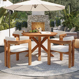 NatureScape Living's 5-piece Acacia Wood Patio Set: a round dining table and four chairs with beige cushions on a patio.