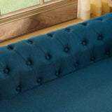 An elegant teal blue tufted backrest and seat of a rectangular elevated dog bed sofa by a sunlit window.