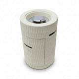 A modern, cylindrical off-white Propane Patio Fire Pit with a textured surface, metallic burner, and side storage door.