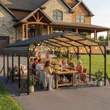 A dark grey Steel Carport Canopy with a translucent roof and triangle-reinforced frame shelters a lively outdoor dinner party.