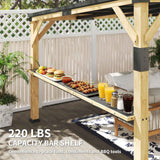 A NatureScape Living 10x14 Lean-To Gazebo with a wooden frame and dark steel roof features a bar shelf laden with food and drinks, stating "220 LBS CAPACITY BAR SHELF."