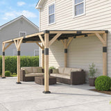 A NatureScape Living 10x20 Lean-To Gazebo with a wooden frame and black steel roof shades a patio with outdoor furniture.