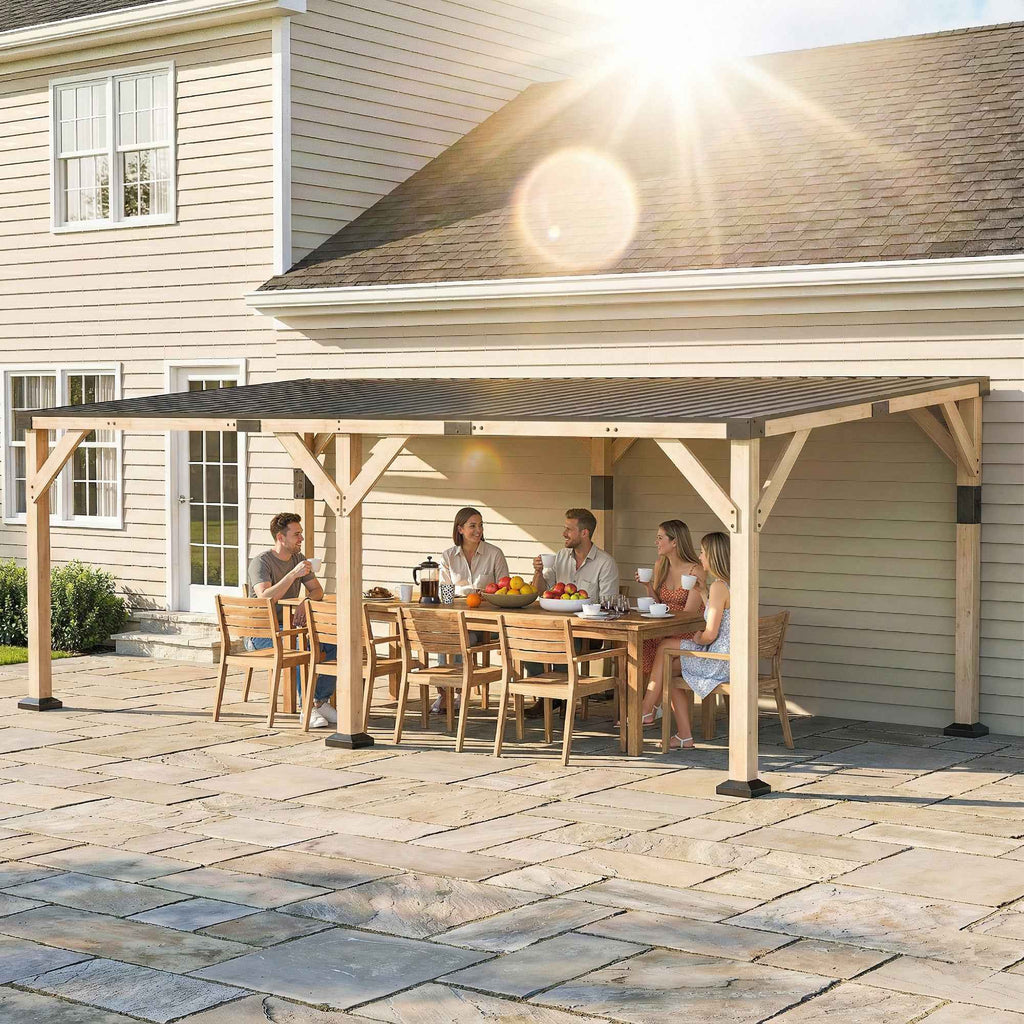 NatureScape Living's 10x20 wooden lean-to gazebo with a steel roof shades friends dining on a sunny patio.