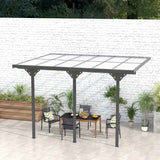 A stylish NatureScape Living 12x10 Polycarbonate Pergola with a clear roof offers UV protection for a patio dining area.