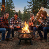 A NatureScape Living 24 Inch Wood Burning Fire Pit with a mesh screen warms four friends roasting marshmallows at a cozy campsite.