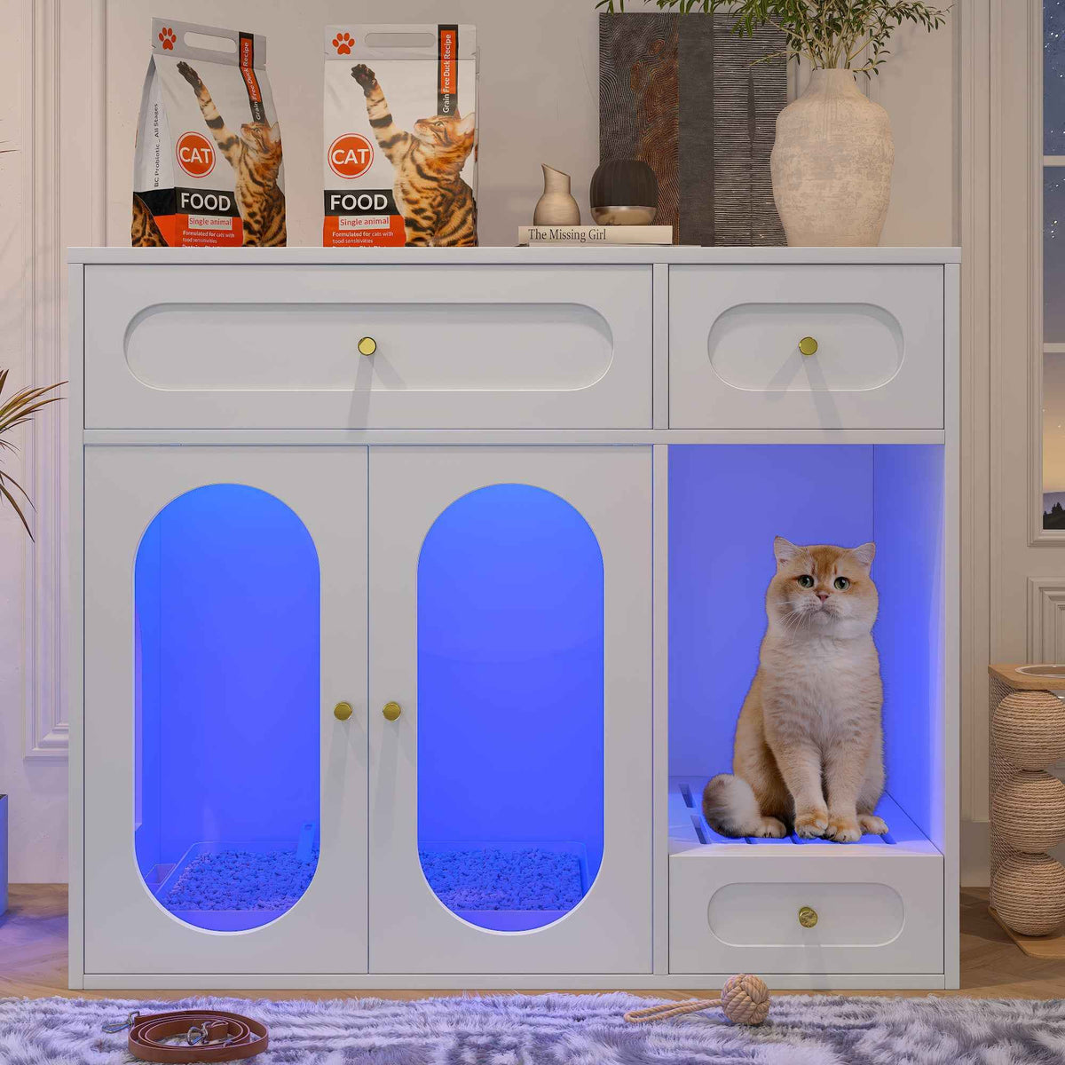 A stylish white Cat Litter Box Enclosure with blue-lit compartments for litter and a ginger cat sitting on an illuminated perch.