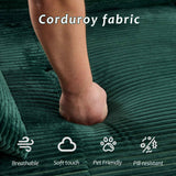A hand presses into the green corduroy fabric of a Dog Sofa Bed, highlighting its breathable, soft, pet-friendly, and pill-resistant features.