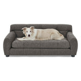 NatureScape Living's elegant grey upholstered Large Dog Sofa Bed with a cream dog resting comfortably on it.