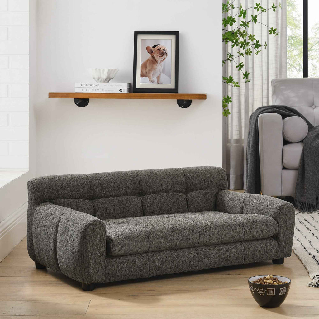 A dark gray tufted Elegant & Comfortable Large Dog Sofa Bed provides a stylish lounge for medium or large pets in a bright living room.