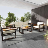 Large 4-piece Outdoor Aluminum Frame Patio Set by NatureScape Living, featuring a beige 3-seater sofa, two armchairs, and wood-top coffee table on a patio.