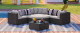 A GO 7-piece brown wicker outdoor sofa set with beige cushions, striped pillows, and coffee table on a deck by a pool.