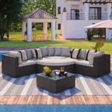 NatureScape Living's GO 7-piece brown wicker sofa set with beige cushions and striped pillows on a wooden deck by a pool.