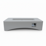 A light gray rectangular propane fire pit table with a modern minimalist design and a control knob on the side.
