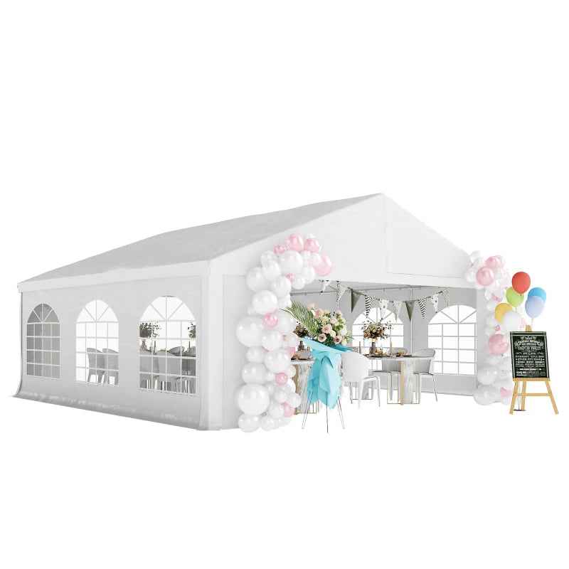 A NatureScape Living Heavy-Duty Wedding Party Tent, a large white outdoor canopy with arched windows, decorated with balloons for a celebration.