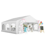 A NatureScape Living Heavy-Duty Wedding Party Tent, a large white outdoor canopy with arched windows, decorated with balloons for a celebration.