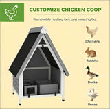 A stylish grey and white NatureScape Living Wooden Chicken Coop with a black roof, featuring a removable nesting box for various backyard animals.